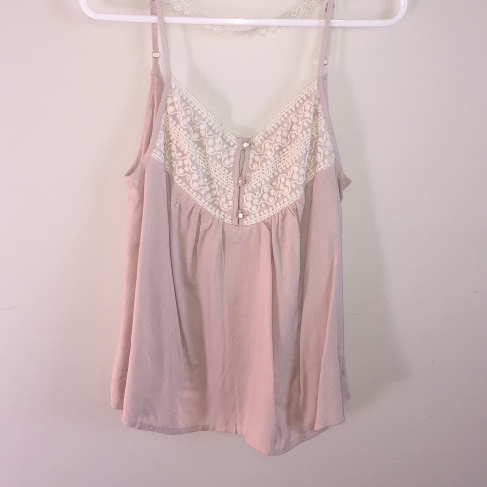 Nude tank with floral lace.